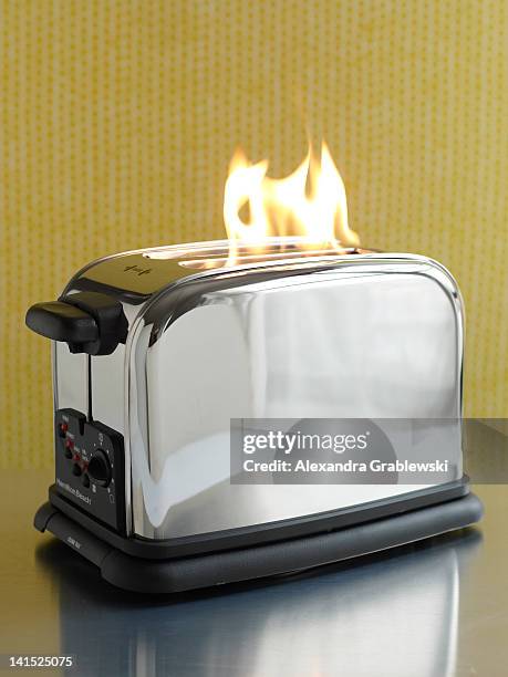 toaster on fire - トースター ストックフォトと画像