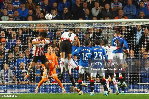Armando Obispo of PSV Eindhoven scores their team's second goal during the UEFA Champions League Play-Off First Leg match between Rangers FC and PSV...