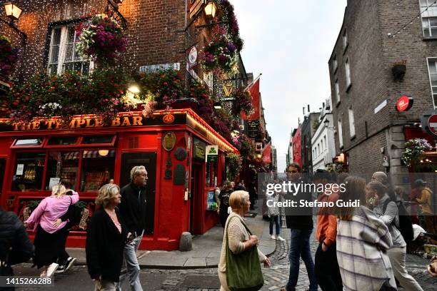 General view of tourists walking near The Temple Bar on August 16, 2022 in Dublin, Ireland. Dublin is the capital of the Republic of Ireland, is...