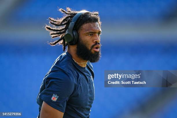 Josh Malone of the Tennessee Titans warms up before the game against the Baltimore Ravens at M&T Bank Stadium on August 11, 2022 in Baltimore,...
