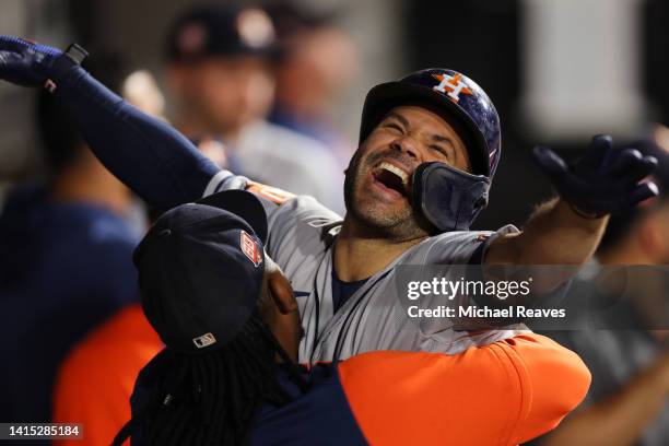 Jose Altuve of the Houston Astros celebrates with Framber Valdez after hitting a solo home run against the Chicago White Sox during the fifth inning...