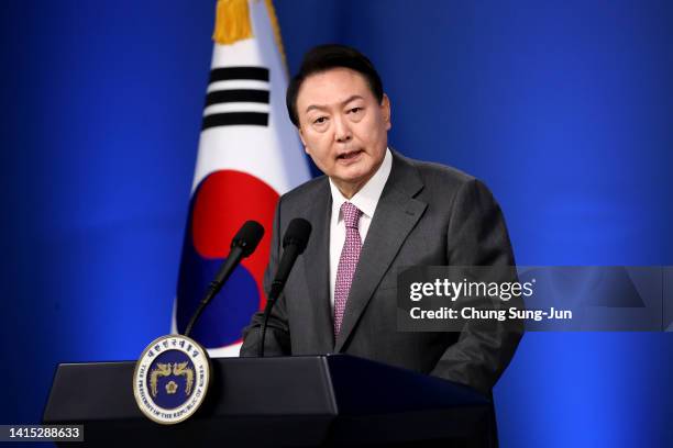 South Korean President Yoon Suk-yeol delivers a speech during his news conference to mark his first 100 days in office at the presidential office on...