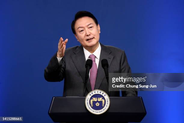 South Korean President Yoon Suk-yeol delivers a speech during his news conference to mark his first 100 days in office at the presidential office on...