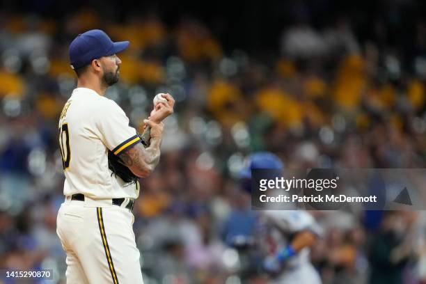 Matt Bush of the Milwaukee Brewers reacts after giving up a solo home run to Chris Taylor of the Los Angeles Dodgers in the seventh inning at...