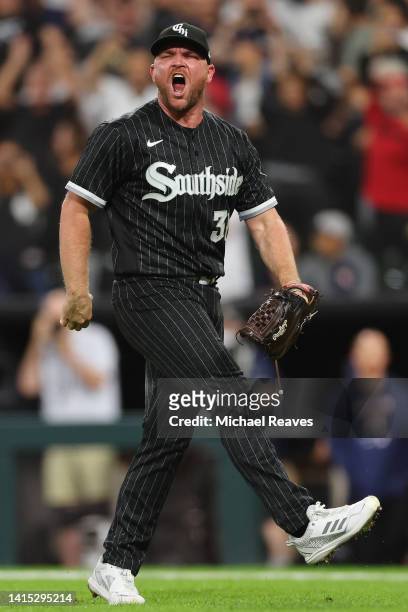 Liam Hendriks of the Chicago White Sox celebrates the final out to defeat the Houston Astros 4-3 at Guaranteed Rate Field on August 16, 2022 in...