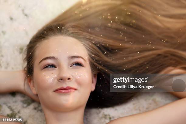 beautiful young girl with long hair. - girl flashing stock pictures, royalty-free photos & images