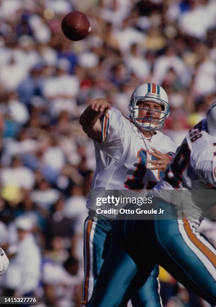 Dan Marino, Quarterback for Miami Dolphins throws the football downfield during the American Football Conference East Division Playoff game against...
