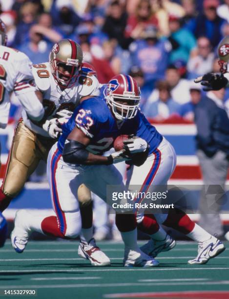 Antowain Smith, Running Back for the Buffalo Bills in motion carrying the football during the American Football Conference East Division game against...