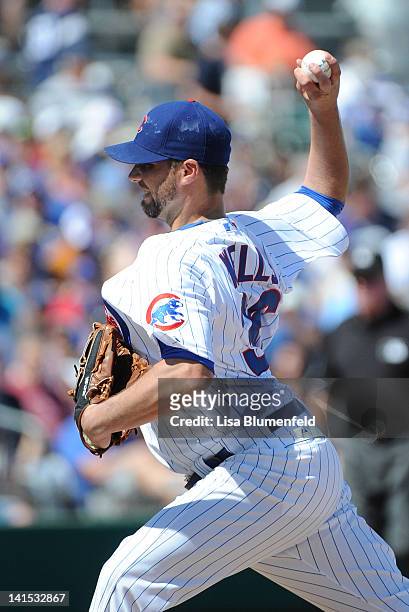 Randy Wells of the Chicago Cubs pitches against the Milwaukee Brewers at HoHokam Stadium on March 14, 2012 in Mesa, Arizona.