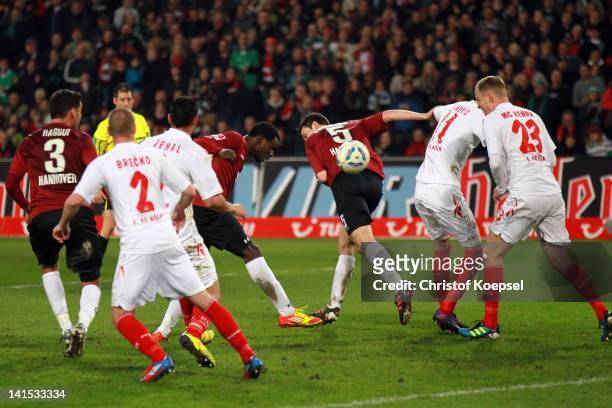 Mame Diouf hafl scores the forth goal during the Bundesliga match between Hanover 96 and 1. FC Koeln at AWD Arena on March 18, 2012 in Hannover,...