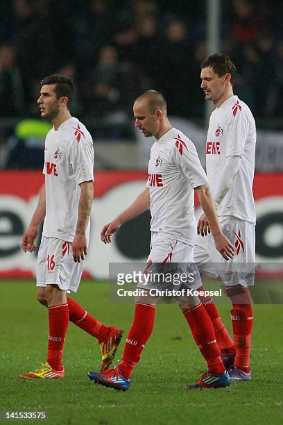 Miaek Ishak, Miso Brecko and Milivoje Novakovic of Koeln look dejected after losing 1-4 the Bundesliga match between Hanover 96 and 1. FC Koeln at...