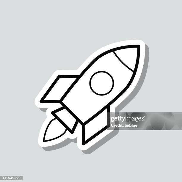 rocket. icon sticker on gray background - kick off stock illustrations