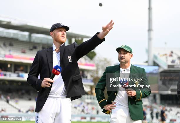 England captain Ben Stokes tosses the coin alongside South Africa captain Dean Elgar ahead of day one of the First LV= Insurance Test Match between...