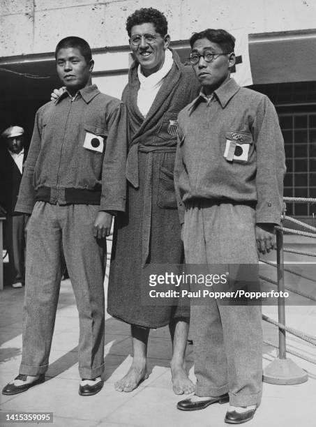 From left, silver medallist Shunpei Uto of Japan, gold medallist Jack Medica of the United States and bronze medallist Shozo Makino of Japan, posed...