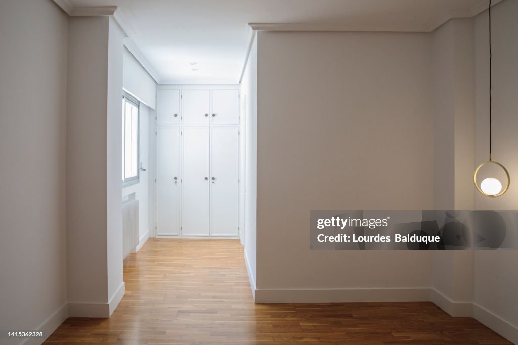 Small empty room with white walls