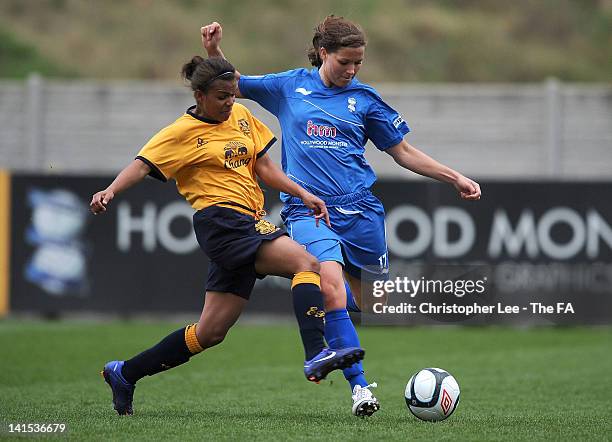 Rachel Unitt of Birmingham clears the ball from Nikita Parris of Everton during the FA WSL Continental Cup match between Birmingham Ladies and...