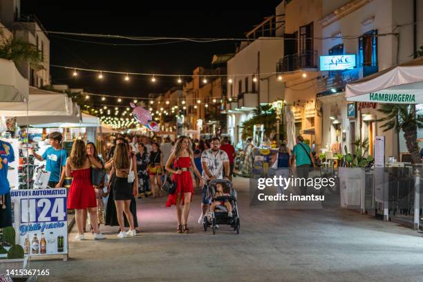 people in street of san vito lo capo - san vito lo capo stock pictures, royalty-free photos & images