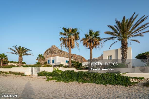 beach and residential houses in san vito lo capo, italy - gulf of palermo stock pictures, royalty-free photos & images