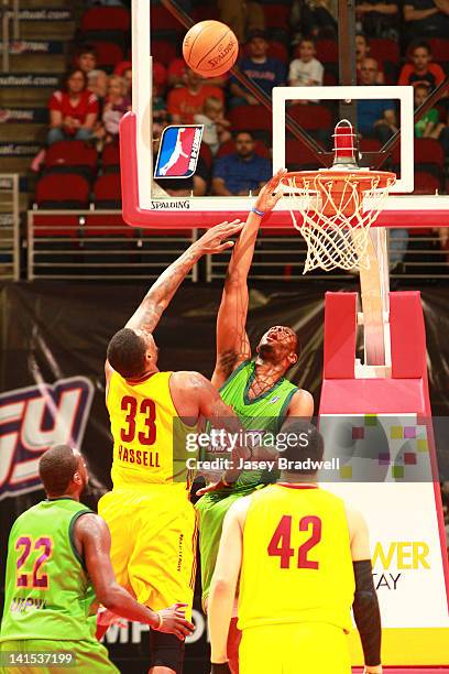 Patrick Ewing Jr. #33 of the Iowa Energy defends against Franklin Hassell of the Canton Charge in an NBA D-League game on March 16, 2012 at the Wells...