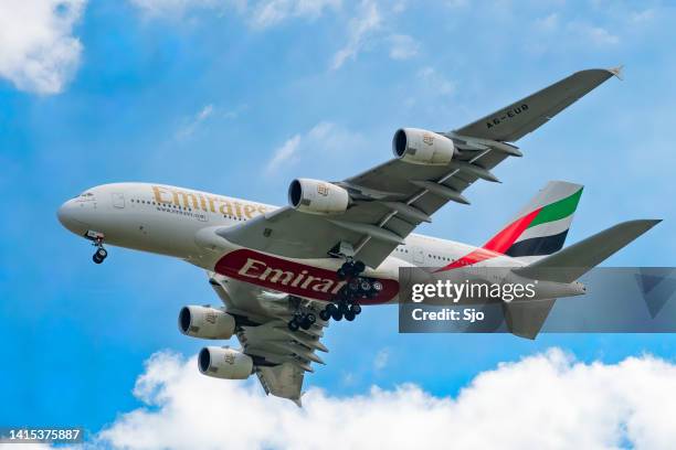 airplane airbus a380-800 of emirates - emirates stock pictures, royalty-free photos & images