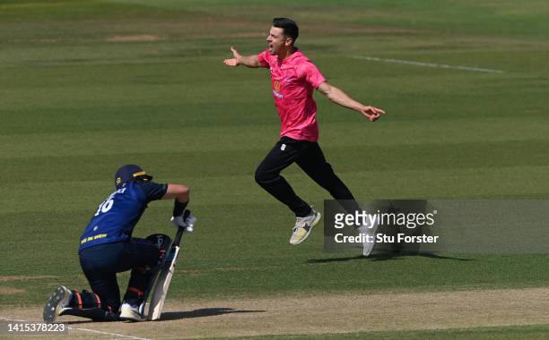 Sussex bowler Bradley Currie celebrates after taking the wicket of Scott Borthwick during the Royal London match between Durham and Sussex Sharks at...