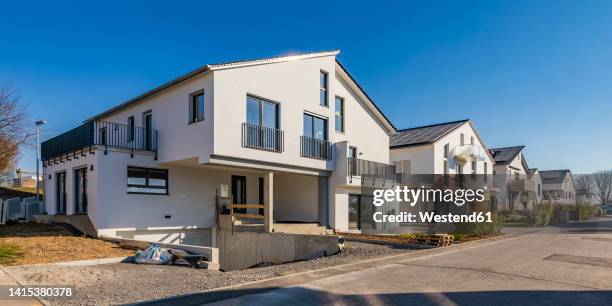 germany, baden-wurttemberg, waiblingen, panoramic view of modern suburban houses - detached house stock pictures, royalty-free photos & images