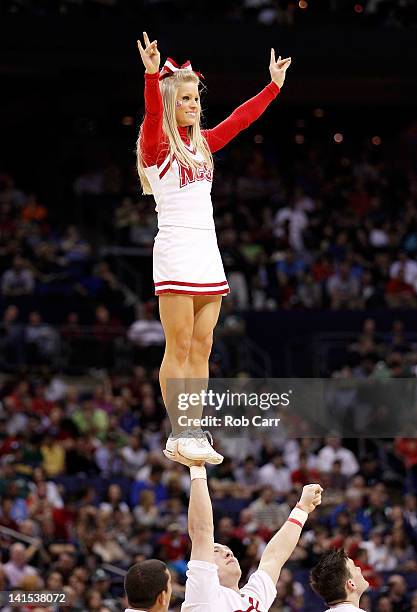 The North Carolina State Wolfpack cheerleaders perform on the court against the Georgetown Hoyas during the third round of the 2012 NCAA Men's...