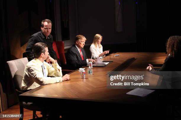 Donald Trump, Donald Trump, Jr and Ivanka Trump intertact with stand-ins during the Celebrity Apprentice live season finale on May 16, 2010 in New...