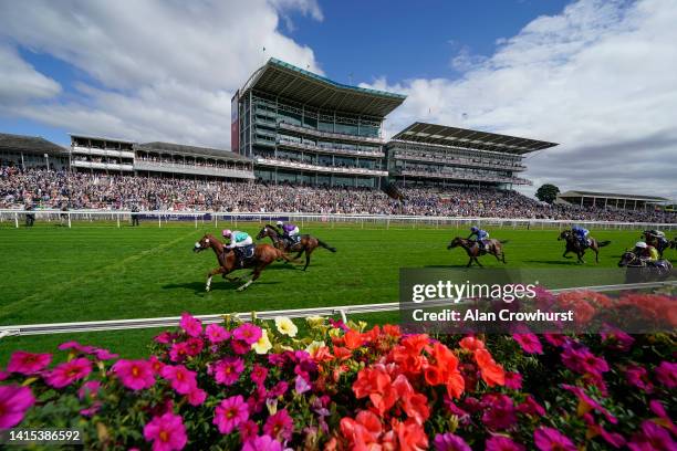 Ryan Moore riding Chaldean win The Tattersalls Acomb Stakes at York Racecourse on August 17, 2022 in York, England.