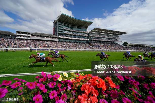 Ryan Moore riding Chaldean win The Tattersalls Acomb Stakes at York Racecourse on August 17, 2022 in York, England.