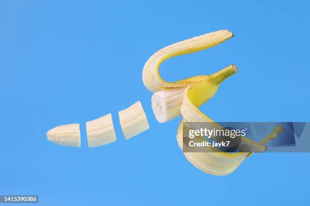 falling banana slices - food jayk7 stock pictures, royalty-free photos & images