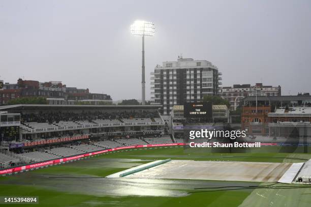 Rain puddles form on the outfield as rain delays play during day one of the First LV= Insurance Test Match between England and South Africa at Lord's...