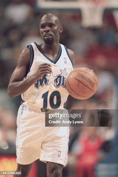 Darrell Armstrong, Point Guard for the Orlando Magic in motion dribbling the basketball during the NBA Atlantic Division basketball game against the...