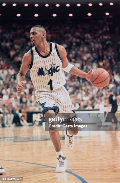 Anfernee Hardaway, Shooting Guard, Point Guard, and Small Forward for the Orlando Magic in motion dribbling the basketball during the NBA Atlantic...