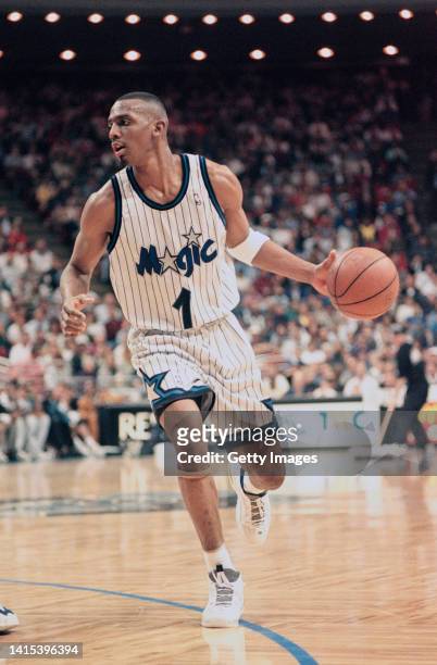 Anfernee Hardaway, Shooting Guard, Point Guard, and Small Forward for the Orlando Magic in motion dribbling the basketball during the NBA Atlantic...