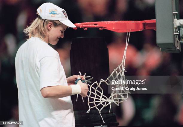 Michelle Marciniak, Point Guard for the University of Tennessee Lady Volunteers basketball team cuts down the after winning the NCAA Division I...