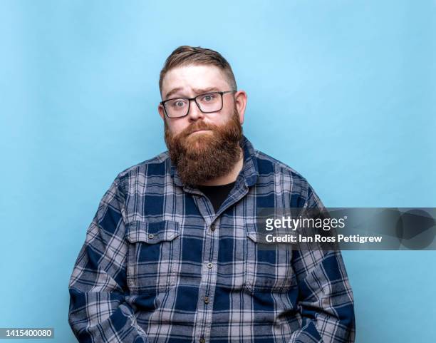man with beard making funny faces - funny face stock pictures, royalty-free photos & images