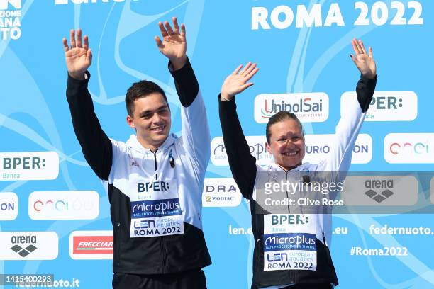 Lou Massenberg and Tina Punzel of Germany pose with their Gold medals on the podium after winning the Mixed 3M Springboard Final on Day 7 of the...