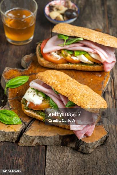 wholemeal bread with tomato mozzarella ham - ciabatta stock pictures, royalty-free photos & images