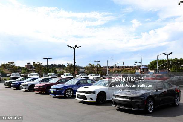 Brand new Dodge Charger cars are displayed on the sales lot at Hilltop Chrysler Jeep Dodge Ram on August 17, 2022 in Richmond, California. Dodge...