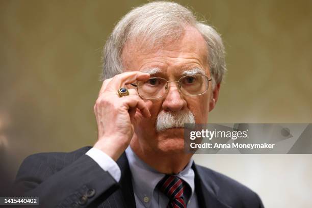 Former National Security Adviser John Bolton speaks to reporters after speaking in a panel hosted by the National Council of Resistance of Iran –...