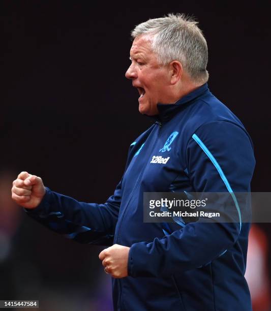 Chris Wilder, manager of Middlesbrough FC celebrates their team's first goal during the Sky Bet Championship between Stoke City and Middlesbrough at...