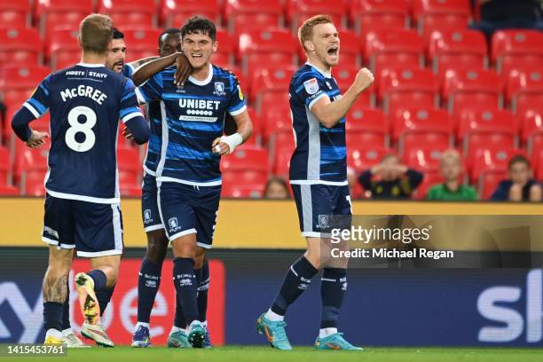 Duncan Watmore and teammates of Middlesbrough FC celebrate their team's second goal, an own goal by Phil Jagielka of Stoke City during the Sky Bet...