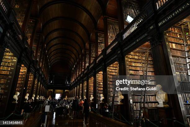 General view as tourists visit the Library of Trinity College on August 17, 2022 in Dublin, Ireland. The Library of Trinity College Dublin serves the...