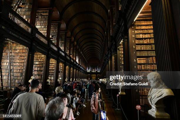 General view as tourists visit the Library of Trinity College on August 17, 2022 in Dublin, Ireland. The Library of Trinity College Dublin serves the...