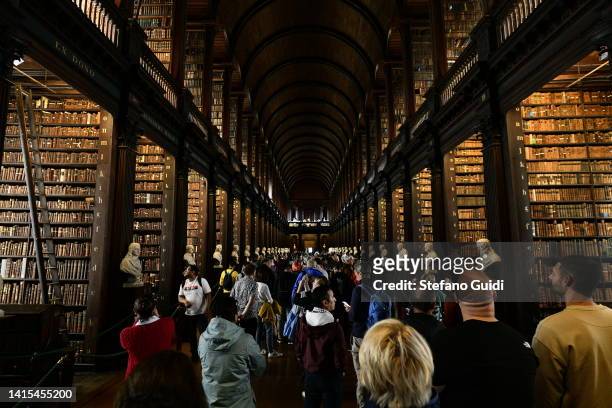 General view as tourists visit the Library of Trinity College on August 17, 2022 in Dublin, Ireland. The Library of Trinity College Dublin serves the...