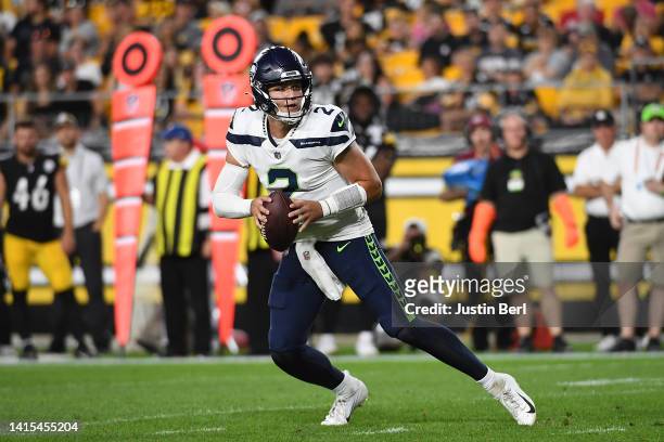 Drew Lock of the Seattle Seahawks in action during a preseason game against the Pittsburgh Steelers at Acrisure Stadium on August 13, 2022 in...