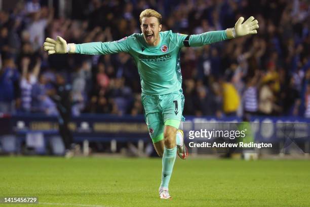 Goalkeeper Joe Lumley of Reading FC celebrates after teammate Lucas Joao scored their team's third goal during the Sky Bet Championship between...