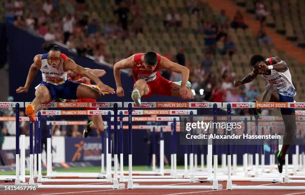 Pascal Martinot-Lagarde of France, Asier Martinez of Spain and Just Kwaou-Mathey of France compete in the Men's 110m Hurdles Final during the...