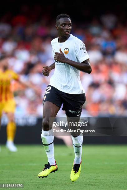 Mouctar Diakhaby of Valencia CF runs during the LaLiga Santander match between Valencia CF and Girona FC at Estadio Mestalla on August 14, 2022 in...